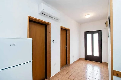 Ferienwohnung mit Pool und Meerblick