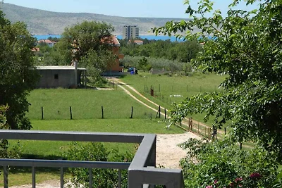 Ferienhaus mit Garten und Klimaanlage