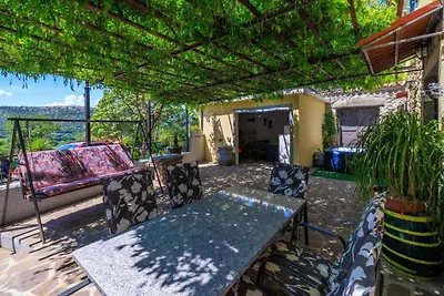Ferienhaus mit Terrasse und Whirlpool