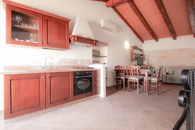 Ferienhaus mit Terrasse 200 m vom Strand