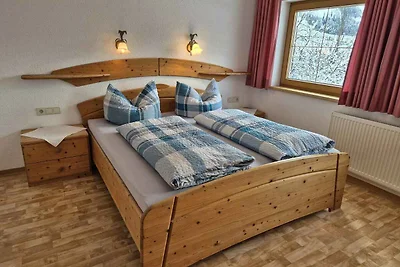 Ferienhaus mit Balkon und Garten