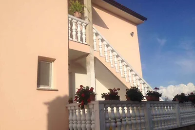 Ferienwohnung mit Pool und Meerblick