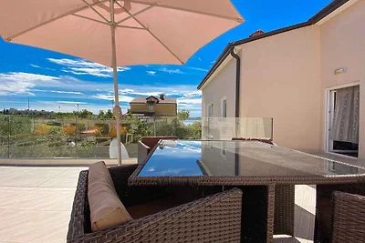 Ferienwohnung mit grosszügigem Balkon mit Tis