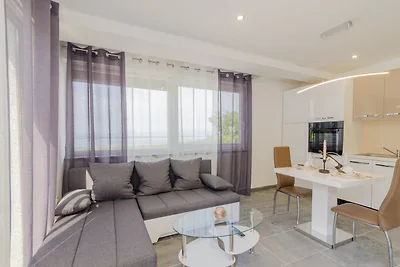 Ferienhaus mit Pool und Meerblick