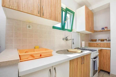 Ferienhaus mit Balkon, Grillmöglichkeit und