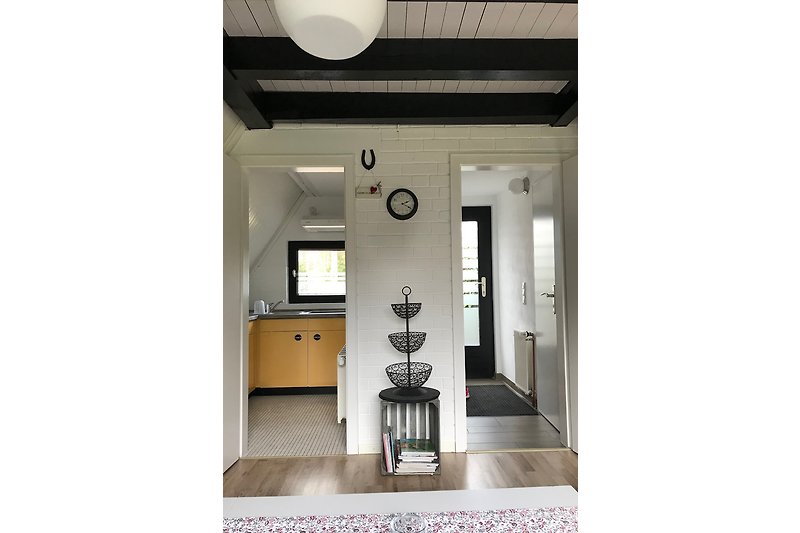 Wohnzimmer / Blick Flur + Küche