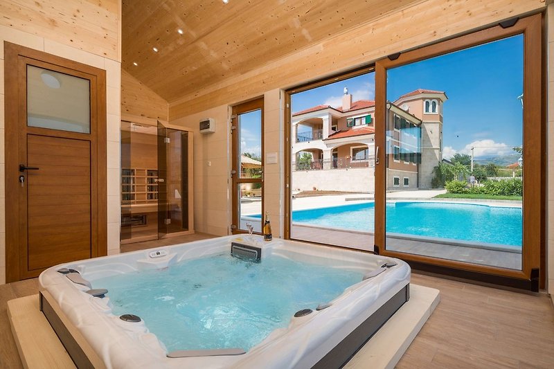 Pool house with sauna and whirlpool