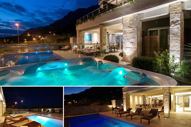 Schwimmbad mit blauem Wasser, bequeme Außenmöbel, schöne Pflanzen und entspannende Atmosphäre.