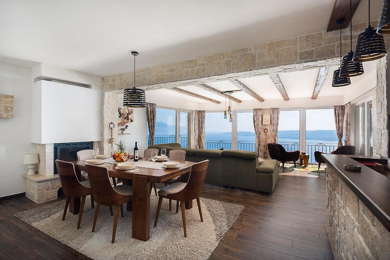 Beautiful dining area and a sea view living room