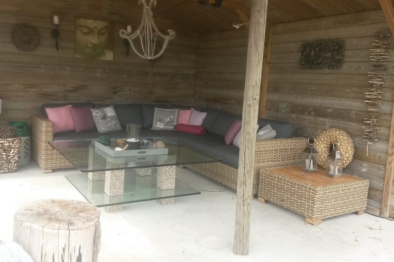 Loungebanken in veranda