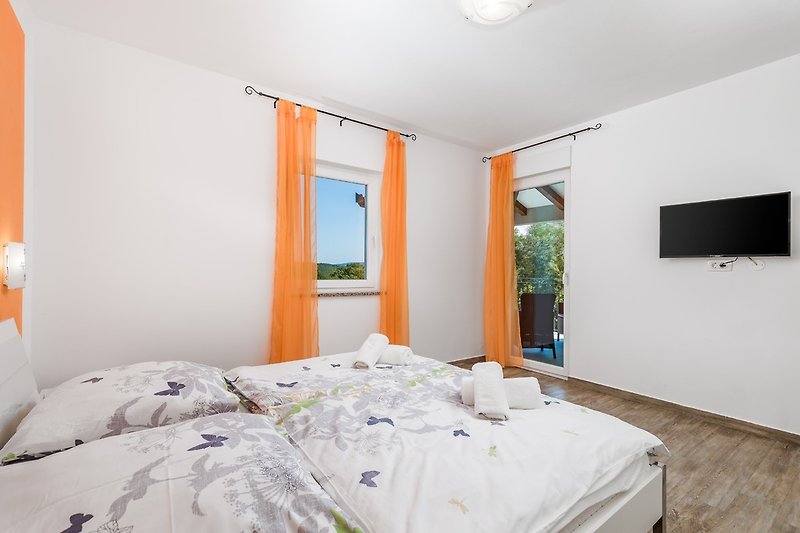 Orange room with balcony