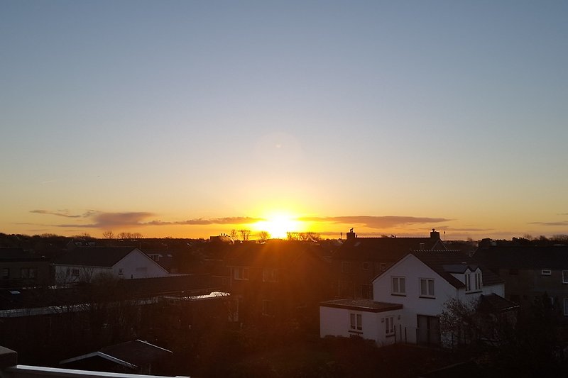 Sonnenaufgang: Blick vom Balkon