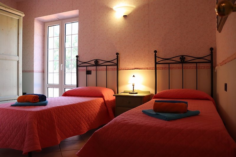 Room 2: Double Bed or Two Single Beds + 1 Single Bed