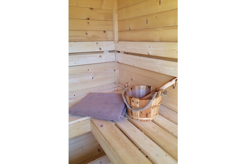 Outdoor sauna with shower