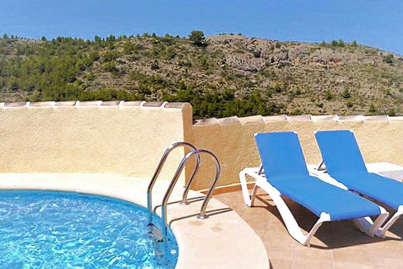 Relax on the sun loungers and enjoy a refreshing swim in the pool