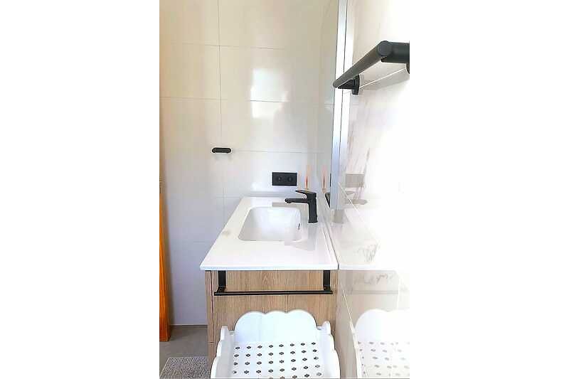 Elegante en moderne badkamers
