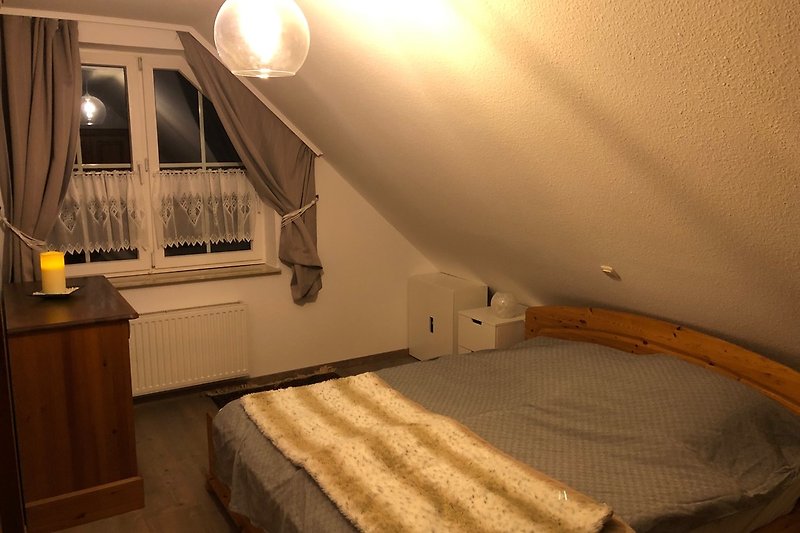 Das Ferienhaus Meerzeit - Schlafzimmer mit Doppelbett