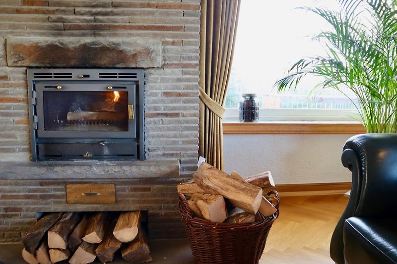 Wooden fireplace in the living room Eifel