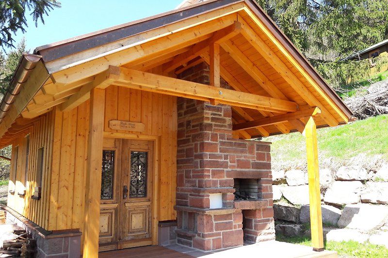 Rudi-Hütte mit überdachtem Gartengrill zur Nutzung für die Gäste