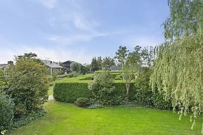 Huis met grote tuin op zuiden en bij meer