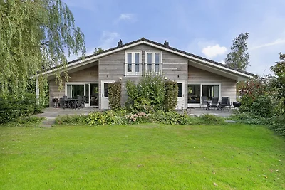 Huis met grote tuin op zuiden en bij meer