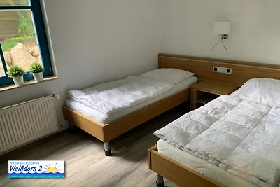 Casa con tetto di paglia con camino wpool& sauna
