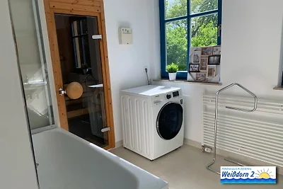 Casa con tetto di paglia con camino wpool& sauna