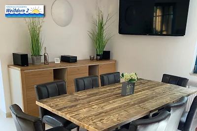 Casa con tetto di paglia con camino wpool& sauna