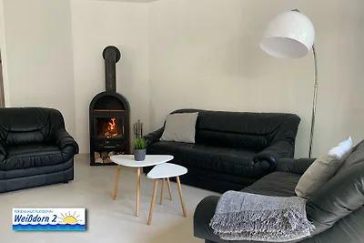 Casa con tetto di paglia con camino wpool& sauna