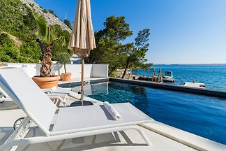 Villa Palazzo Maestral beachfront by Villas...