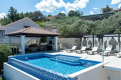 Seafront Villa Mijo by Villas Guide
