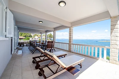 Seafront Villa Mijo by Villas Guide