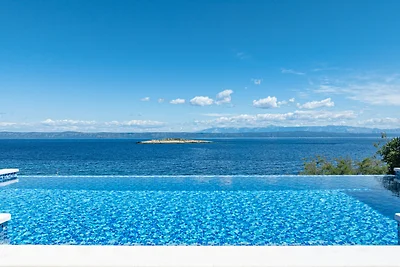 Seafront Villa Mijo by Villas Guide