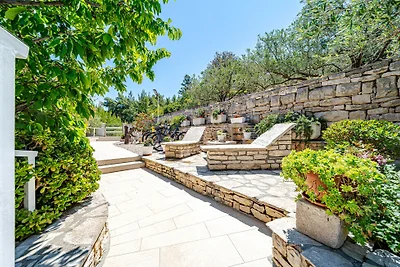 Seafront Villa Mijo by Villas Guide