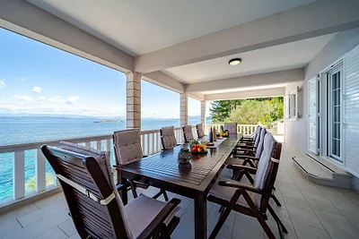 Seafront Villa Mijo by Villas Guide