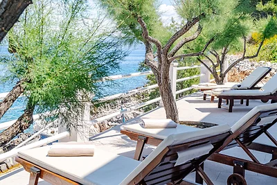 Seafront Villa Mijo by Villas Guide