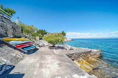 Seafront Villa Mijo by Villas Guide