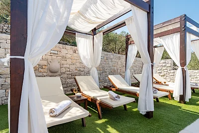 Seafront Villa Mijo by Villas Guide