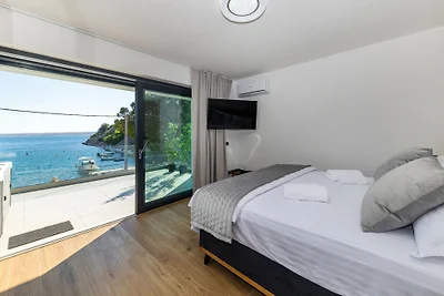 Villa Palazzo Maestral beachfront by Villas...