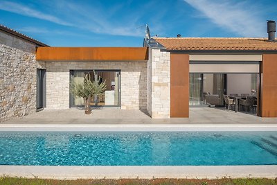 Modern villa Oliba with pool and grill in...