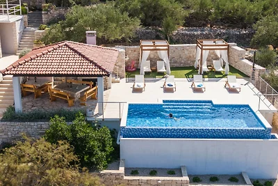 Seafront Villa Mijo by Villas Guide