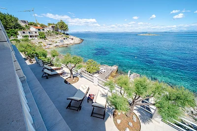 Seafront Villa Mijo by Villas Guide