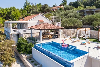 Seafront Villa Mijo by Villas Guide