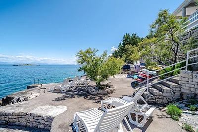 Seafront Villa Mijo by Villas Guide