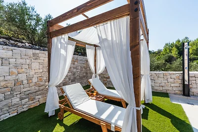 Seafront Villa Mijo by Villas Guide