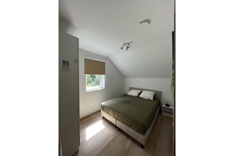 Slaapkamer 1 met 2-persoons bed  vakantiehuis Le Club in Barvaux - Durbuy