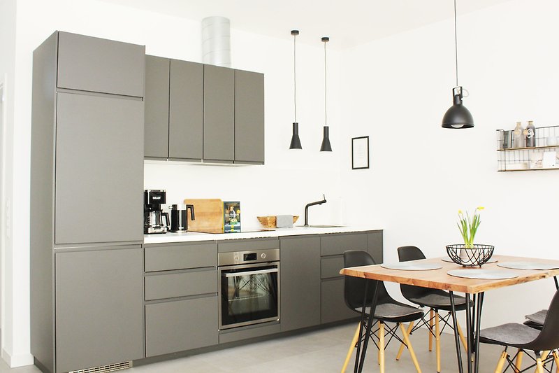 Modern kitchen block with extensive equipment