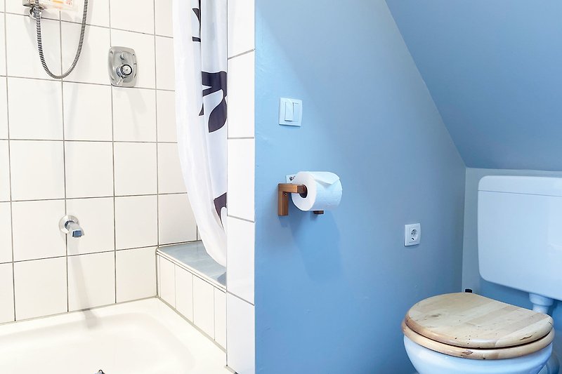 Bathroom with shower/WC.