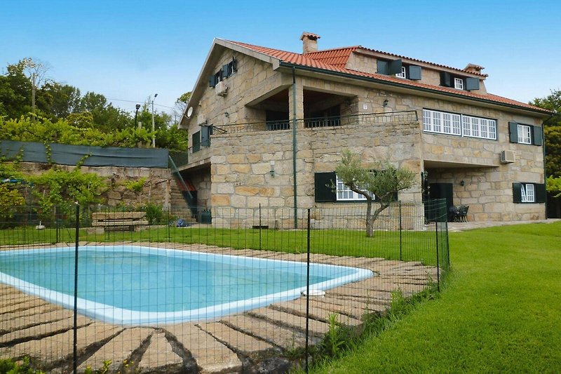 Exterieur vakantiehuis (zomer)
