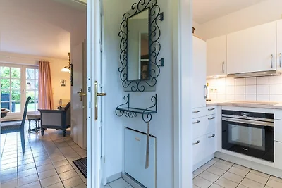 Apartment mit Kamin in einer reetgedeckten...